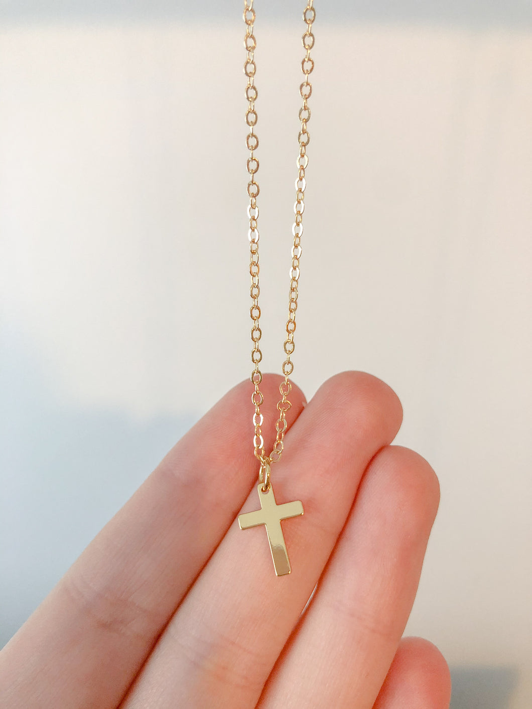 Gold cross necklace